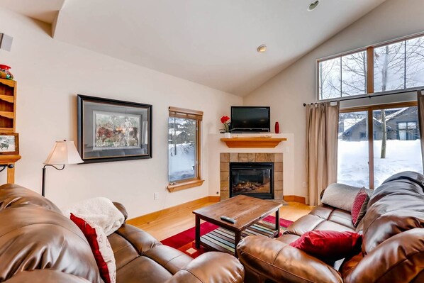 Hot Tub is just outside the sliding door to the Right...Gas Fire to warm up the space!