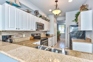 Fully Stocked Kitchen with all the Amenities! Perfect for Home Cooked Meals!