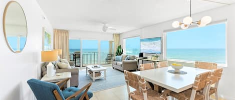 Let the ocean surround you in this comfortable, bright and airy living room. Walk out onto one of two private balconies in the condo