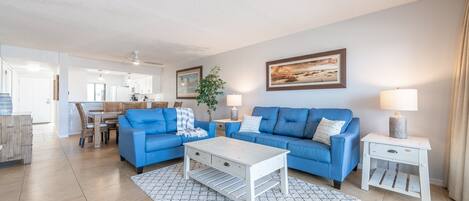 Living room with walkout balcony, 55" TV & QUEEN sofa sleeper