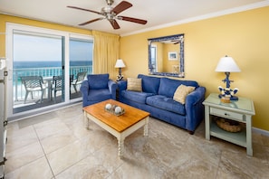Living Room - Just steps away from your private balcony!