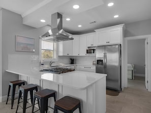 Amazing kitchen with additional breakfast bar seating