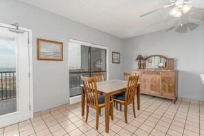 The simple seating arrangement for four features cushiony chairs that invite relaxed conversation during meals or playful banter on game night. 