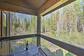 Admire the wooded view from your private balcony.
