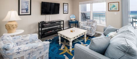 Inviting beach front living room - Large flat screen, sleeper sofa and memorable gulf views