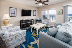 Inviting beach front living room - Large flat screen, sleeper sofa and memorable gulf views