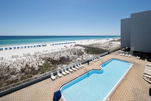View of outdoor pool - Plenty of lounge chairs in the pool area. You will sure find a spot for yourself