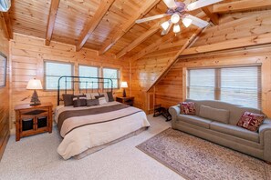 Upstairs Master King Suite has everything you need - TV, Private Bath, Jacuzzi tub, and a sleeper sofa for 2!