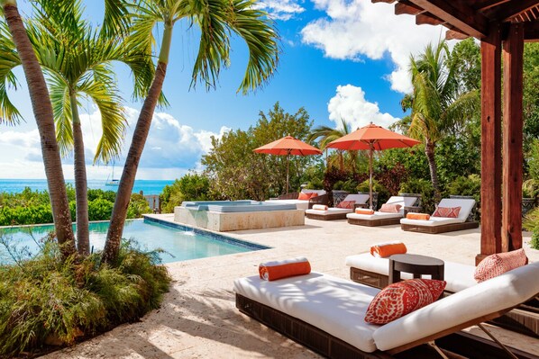 Lounge poolside with your guests and soak in the sun.