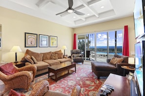 Living room with views of the hill country and pool