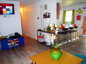 Living room area: RokuTV with Sling Orange and Blue