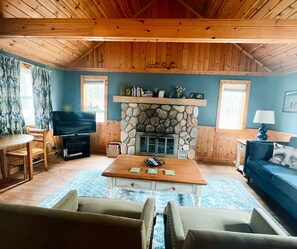 Living room with fireplace. - Living room with fireplace.