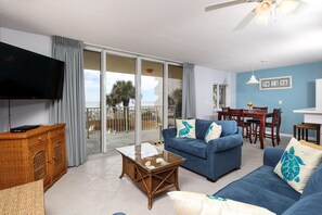 Open floor plan - Great setup and lots of comfy seating in this 2 bedroom beach front condo! Sit back, relax and enjoy the gorgeous views!