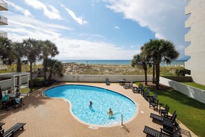 Balcony view - Lounge in the sun by the outdoor pool.