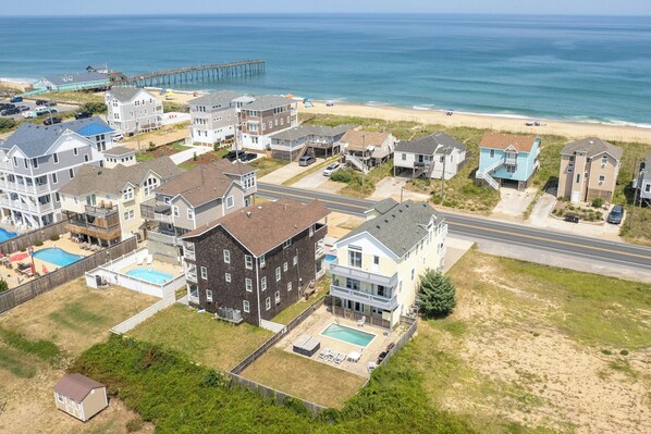 Aerial View of Flip Flop with the Ocean Across the Street