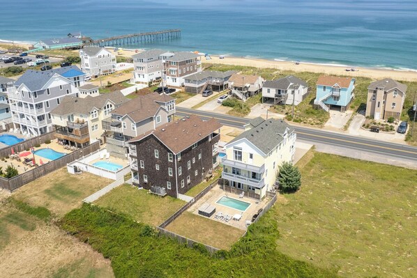Aerial View of Flip Flop with the Ocean Across the Street