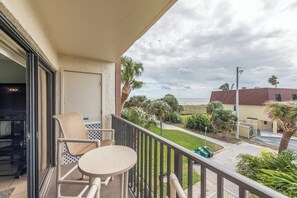 Cozy private balcony, perfect for morning coffee with a view.