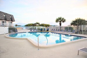 Beautiful, spacious oceanfront heated pool with a stunning view.