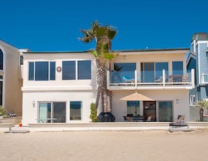 Photo showing front of building. This unit comes with the use of the entire lower portion of the building as photographed - inside. The patio use is just the right side as the owner uses the left side when around upstairs.