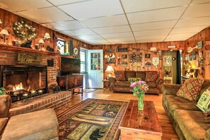 Living Room | Sleeper Sofa | Wood-Burning Fireplace