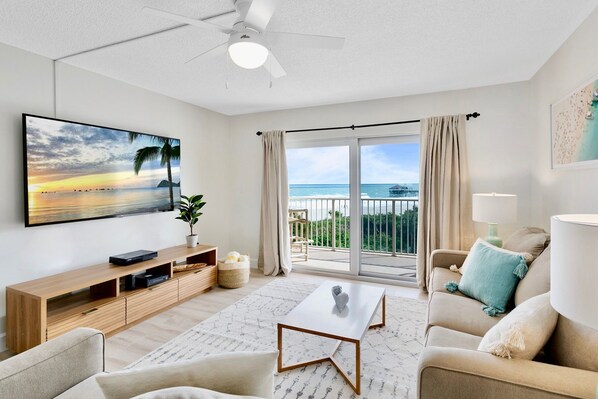 Bright, upgraded living room with elegant furnishings and stunning ocean views.