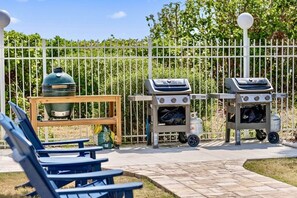 Outdoor grilling area with dual BBQs, perfect for cookouts