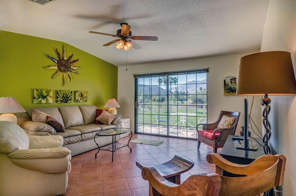 Bright and Cheerful Living Room Overlooking the Golf Course