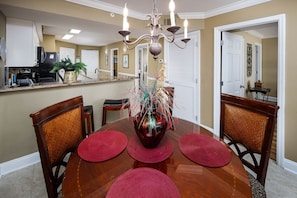 Dining Area - The dining table seats 4 with more space at the breakfast bar