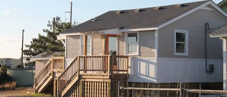 East exterior view of Tandem Cottage.