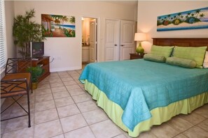 Our tropical-themed master suite with attached bathroom will give you nothing but sweet dreams.