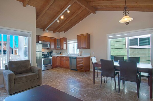 Inside photo showing kitchen & dining area