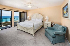 Master Bedroom - King sized bed in this beautiful beach front master bedroom..Waking up to the sounds of waves crashing from your private balcony entrance, A perfect start to any day!