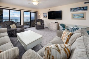 Large yet cozy family room with large flat screen - Open view of this spacious 2 bedroom 6th floor unit. SMART TV!