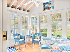 Head through the French doors to the sunroom that leads out to the deck- 58 Longs Lane Chatham Cape Cod New England Vacation Rentals