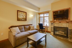 Living Area | Sleeper Sofa | Desk | Dedicated Workspace | Fireplace | TV