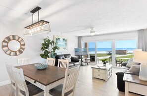 This modern dining area offers an inviting space to enjoy meals with family and friends.