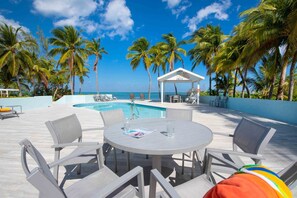 Alfresco dining along the pool deck. 
