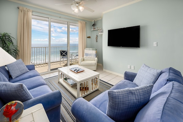 Very comfortable and cozy beach front living room! - Very comfortable and cozy beach front living room! The sofa pulls out to be a queen sleeper - this unit sleeps up to 8 guests!