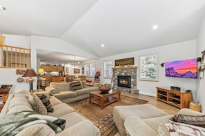 Enjoy the vaulted ceilings in the living room and tahoe decor