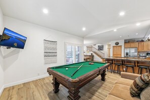 Watch the HDTV while shooting pool