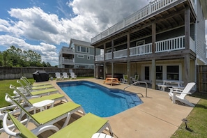 Outdoor Pool Area with Hot Tub, Sun Loungers, Table, Outdoor Shower, and Grill 