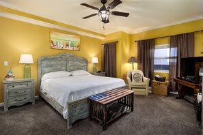 Master bedroom - Extra seat for reading at night. Spacious master suite for max comfort.