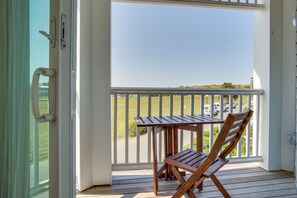 Covered Balcony | Outdoor Dining | 2nd-Floor Unit | Elevator Access