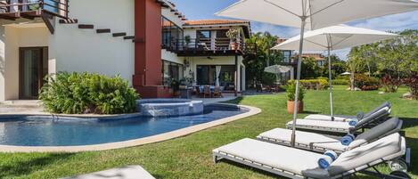 This luxurious villa has a private pool and hot tub.
