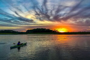 Enjoy a spectacular sunset from the boat dock or from a kayak!