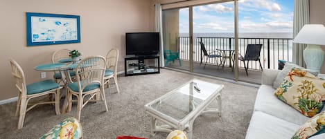 Spacious beach front living room with seating for everyone.