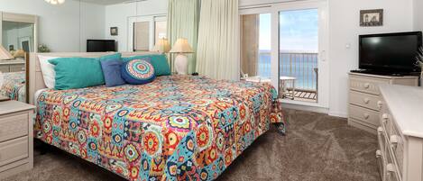 Beach front master suite - Master bedroom features king size bed and direct access to the balcony