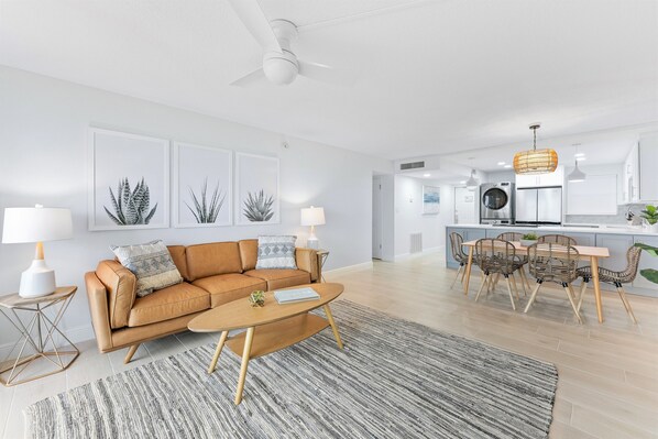 Bright and modern living room with a cozy, stylish touch—perfect for relaxation.