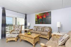 Our living room has room for the family on movie nights. Unwind and cool down after a long day on the beach in our family-friendly living space.