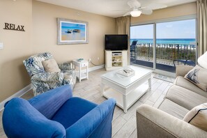 Living Room - Just steps away from your private balcony!